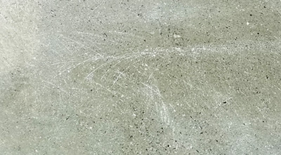 固化劑地坪施工如何消除打磨痕跡？